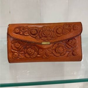 VTG Hand tooled rose leather wallet.